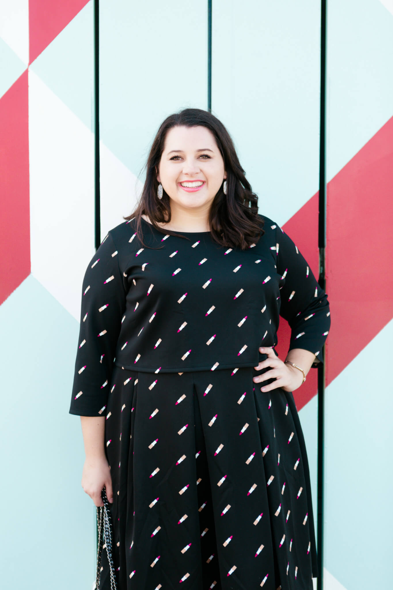 Emily Bastedo, the blogger behind curvy style blog, Something Gold, Something Blue shares this girly lipstick print matching set from the Ashley Nell Tipton collection for Boutique+ at JCPenney. She has styled this all black outfit with dainty silver accesorries.