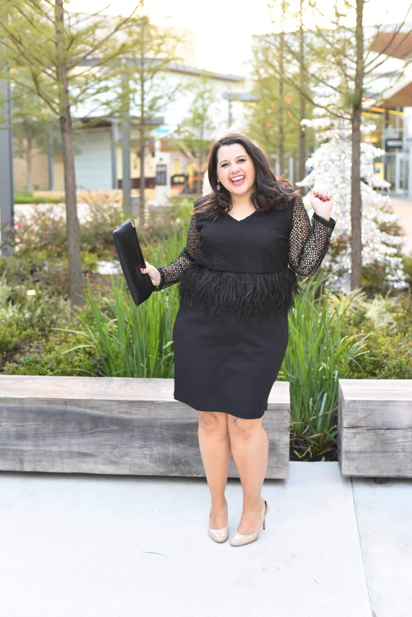 Emily from Something Gold, Something Blue is sharing her formal holiday party outfit including fabulous nude pumps, a gorgeous black lace and feather peplum dress and red crystal statement earrings. - @emilySGSB - About Emily, the woman behind popular Houston Curvy Fashion Blog, Something Gold, Something Blue