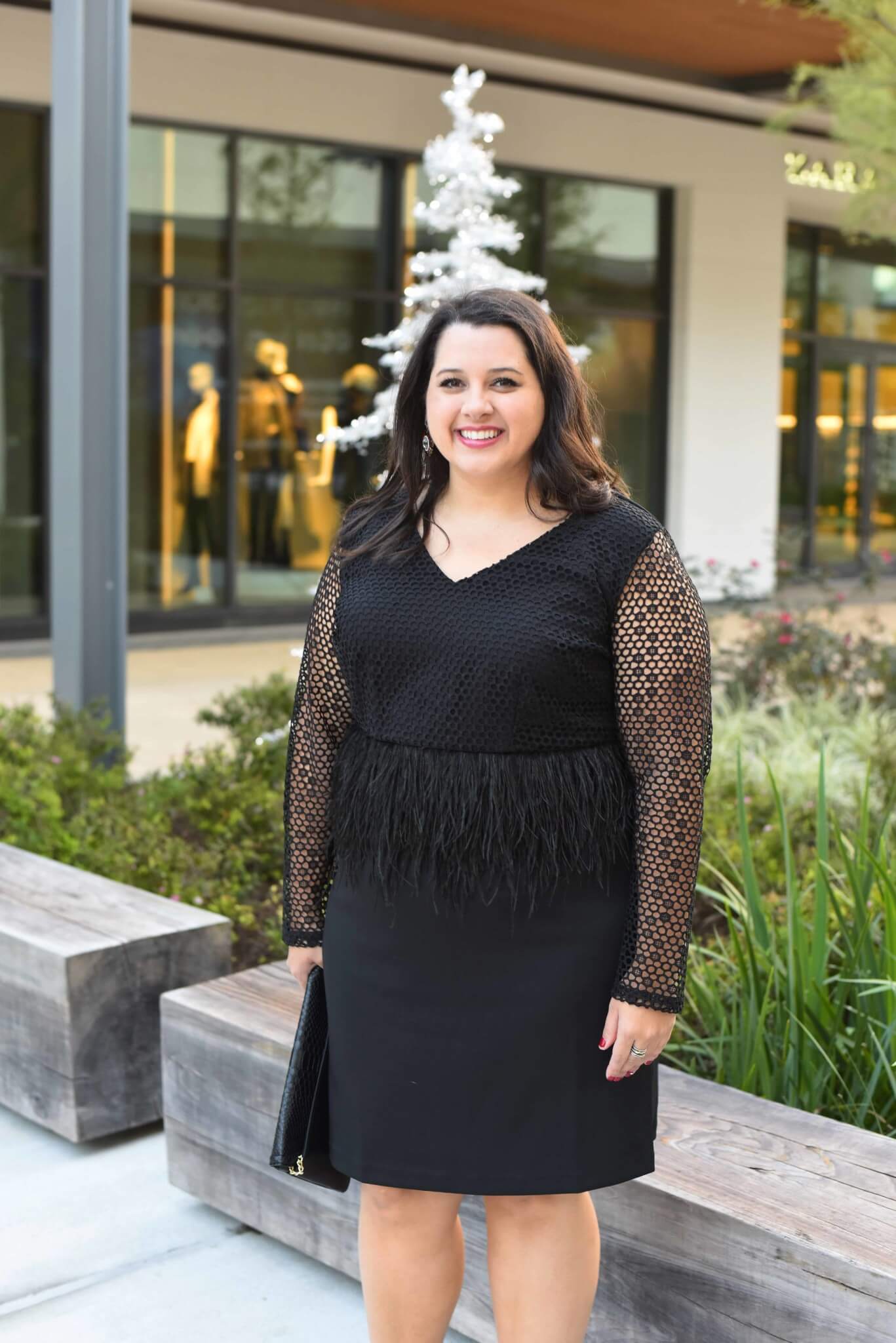 Emily from Something Gold, Something Blue is sharing her formal holiday party outfit including fabulous nude pumps, a gorgeous black lace and feather peplum dress and red crystal statement earrings. - @emilySGSB