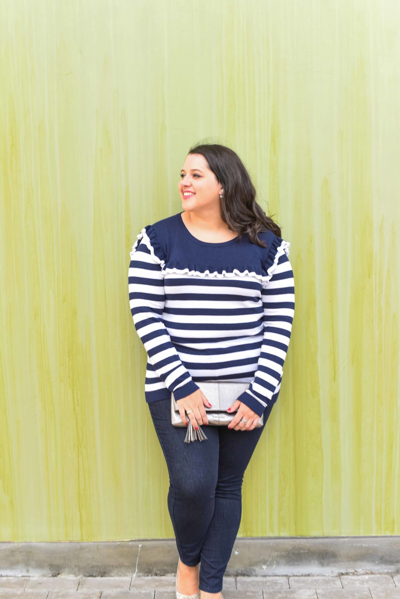 What to wear during the spring transition - It feels like Houston's winter weather is always like the ups and downs that Spring can bring. This lightweight striped sweater makes for the perfect item to complete your spring outfit. 