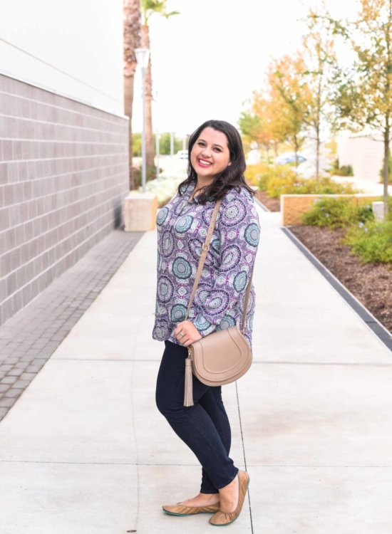 How to style a colorful top for work and play. This colorful tunic can easily go from work to a weekend full of activities. I paired this top with a pair of jeans which can be worn for a casual day at work.