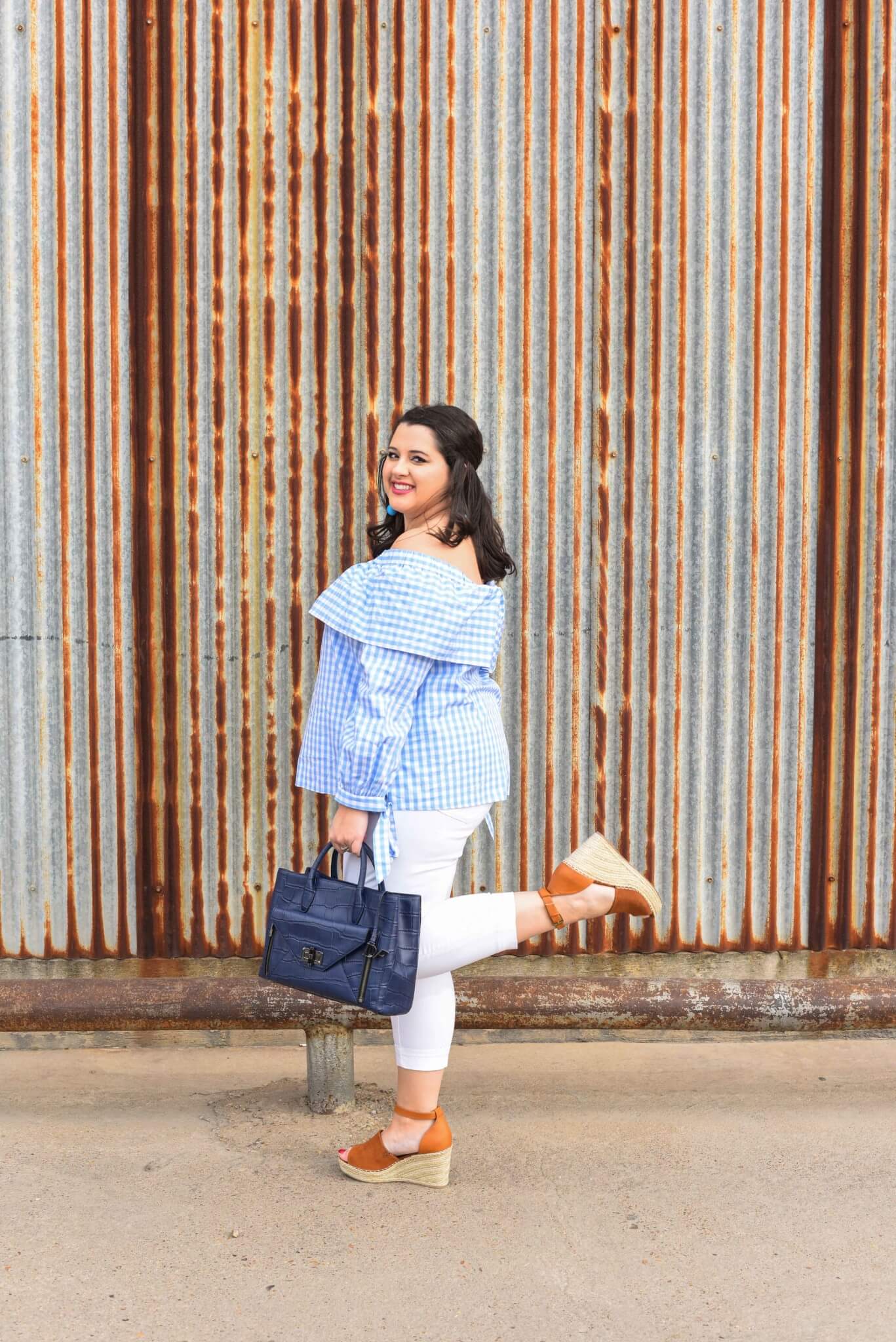 What speaks to spring more than a gingham off the shoulder top and the IT shoes of 2017, the Steve Madden Wedges. Spring style, plus size fashion, curvy fashion, preppy style. - About Emily, the woman behind popular Houston Curvy Fashion Blog, Something Gold, Something Blue