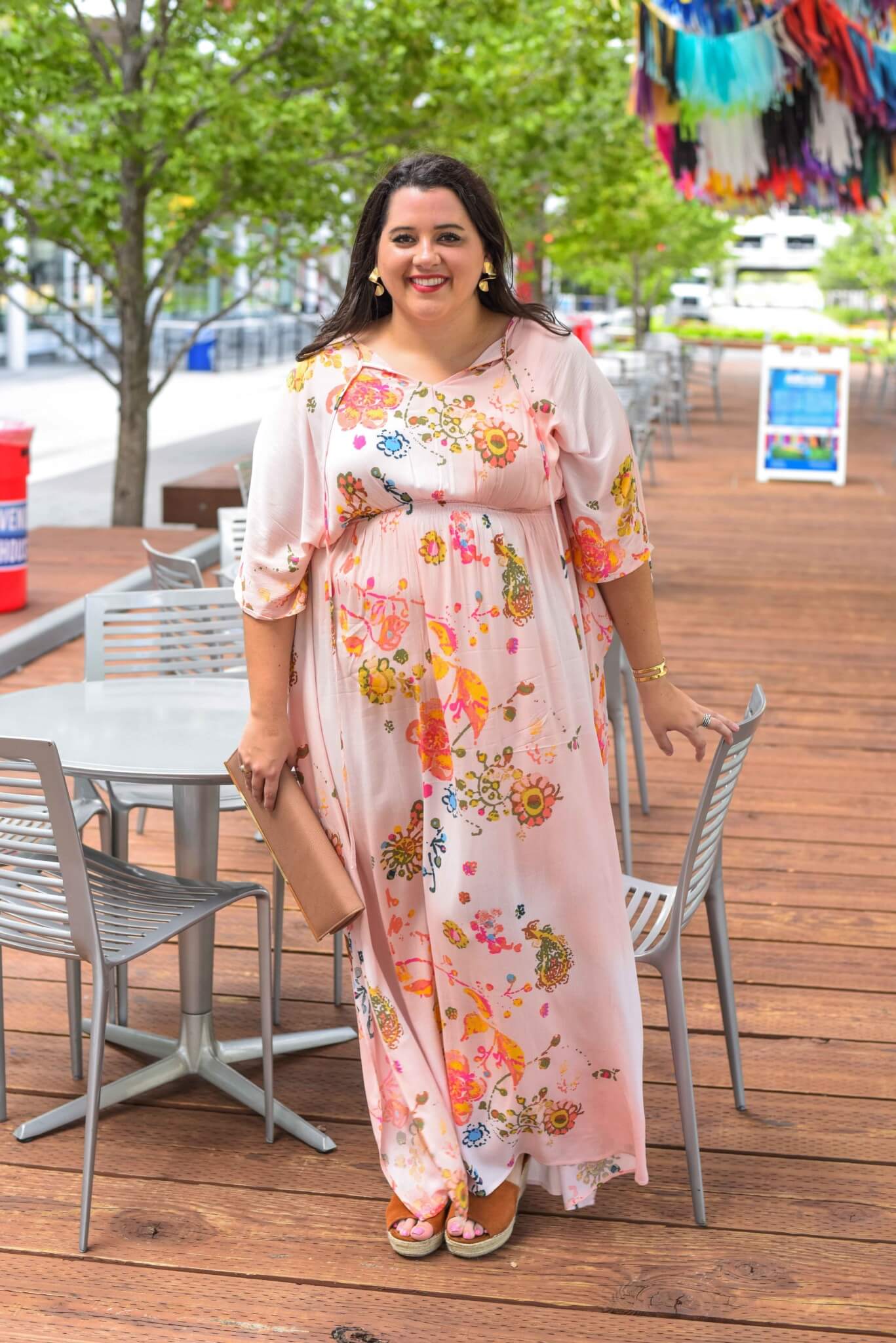 An empire waist maxi dress is extremely flattering for any plus size woman looking to flatter their midsection. The print on this Melissa McCarthy Seven7 dress is great for a summer time day exploring your hometown. - Gwynnie Bee outfit by popular Houston fashion blogger Something Gold, Something Blue