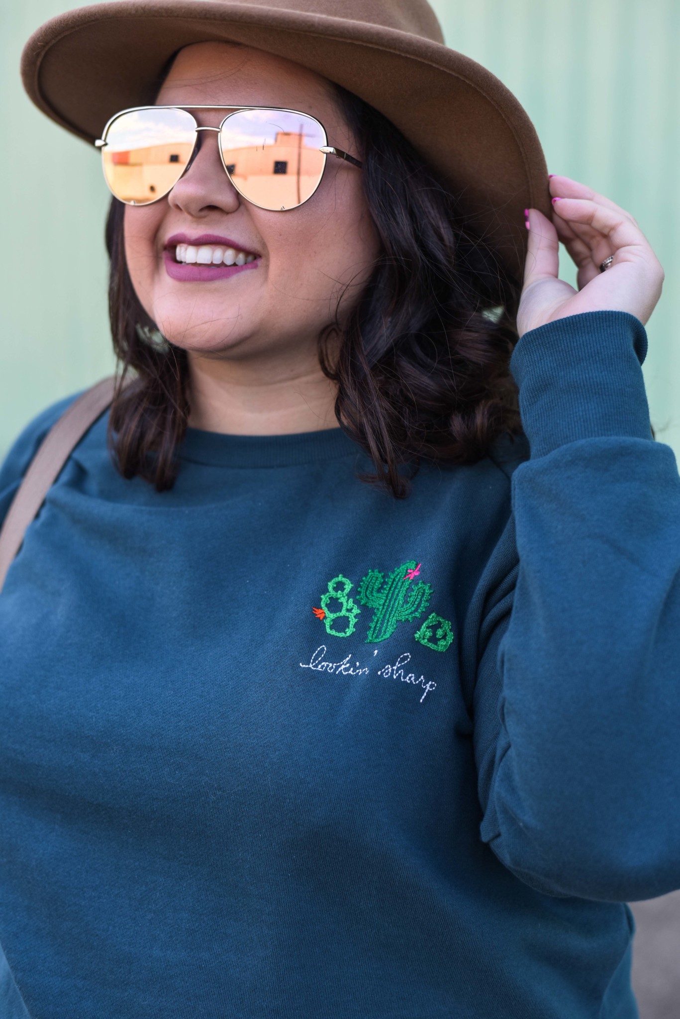 A detailed look at the plus size brand, Ori's embroidered sweatshirt. #plussize