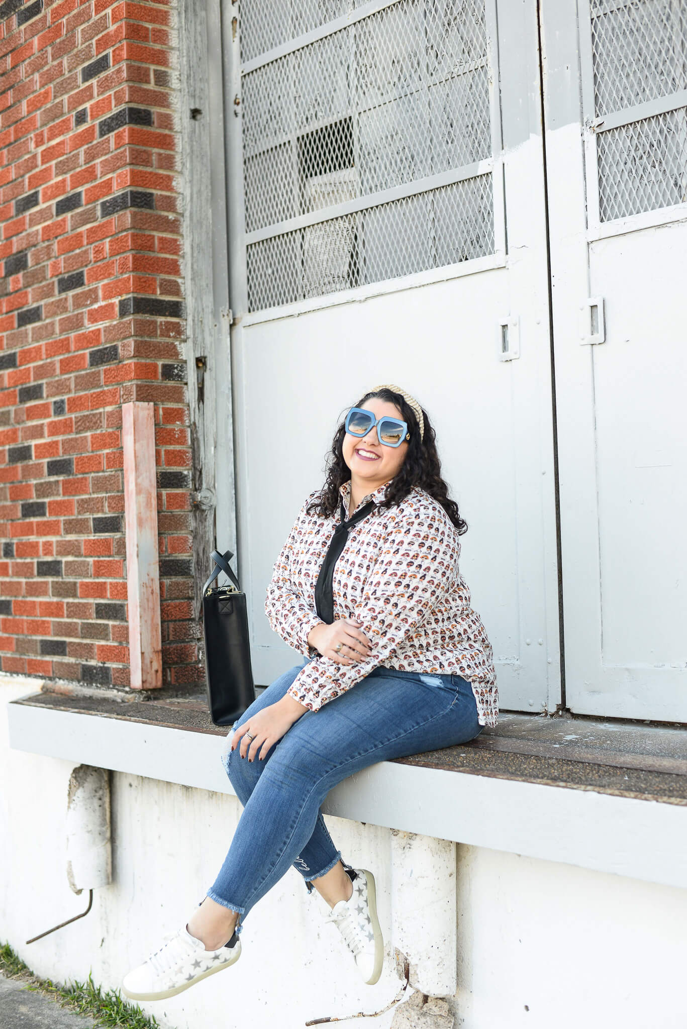 Jeans and bow tie blouse make for the perfect plus size weekend look