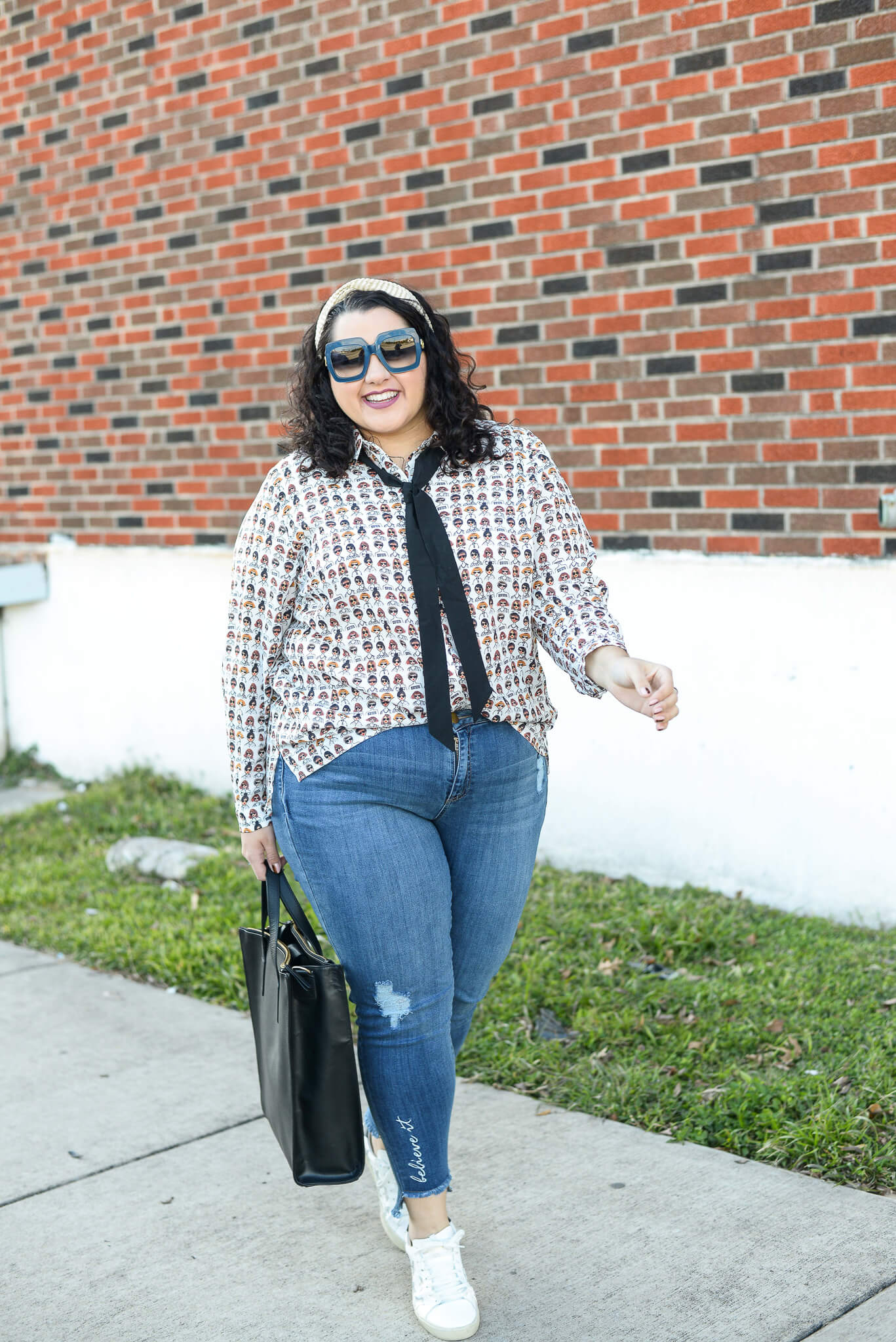 Running around town doesn't have to be boring when you have this plus size statement blouse in your closet! 